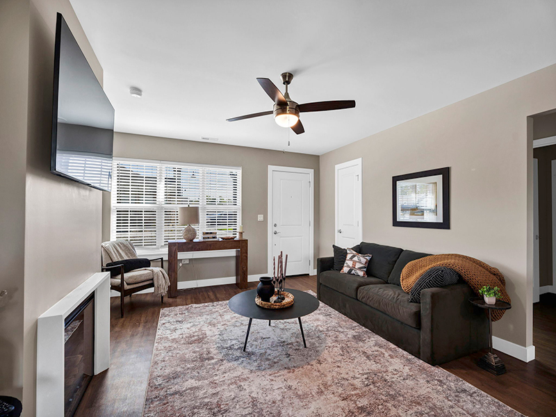 Senior-friendly living room and accessible kitchen at Cedarhurst of Frankfort's Independent Living at Cedarhurst Cottages