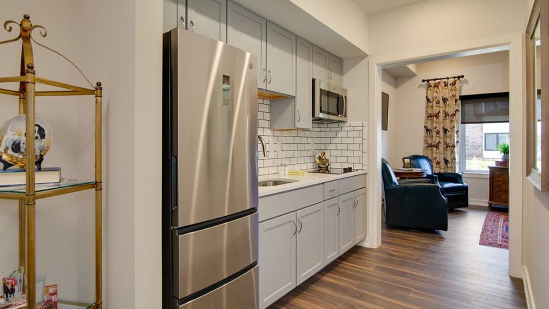 An accessible kitchenette in a senior apartment at Cedarhurst of Hamburg, designed for ease of use and independence.