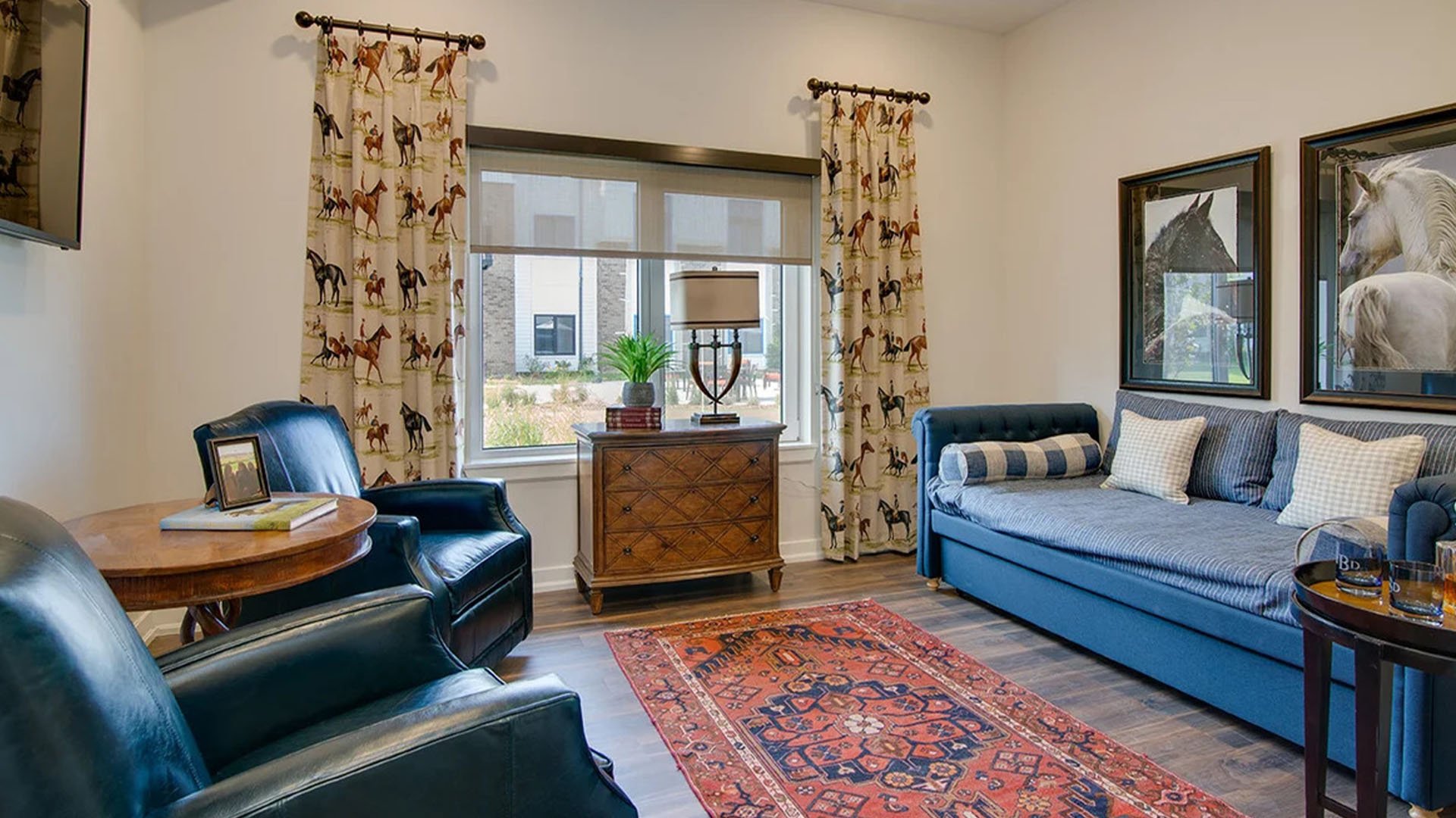 Senior-friendly apartment living room at Cedarhurst of Hamburg, offering comfortable and accessible design for residents.