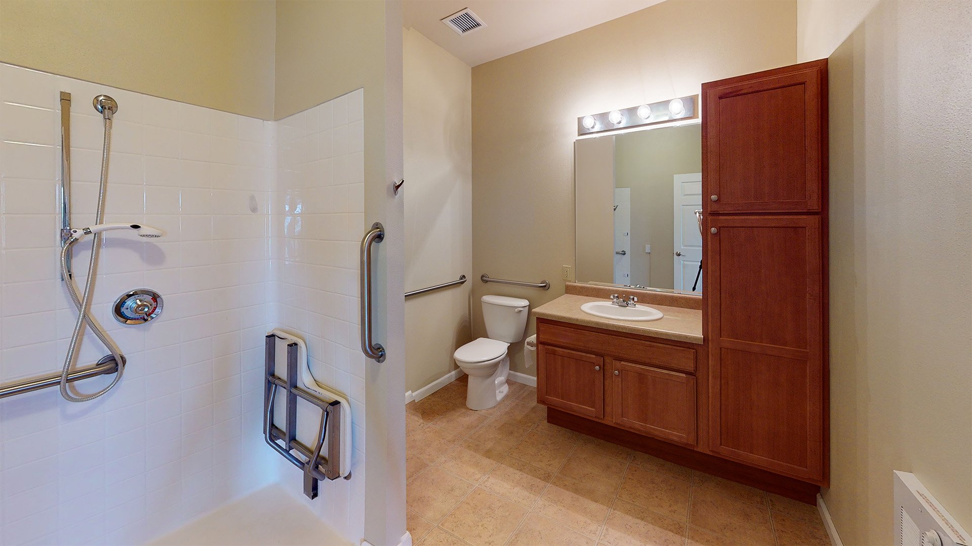 Bathroom of a senior apartment at Cedarhurst of Highland, built with accessibility features to support residents