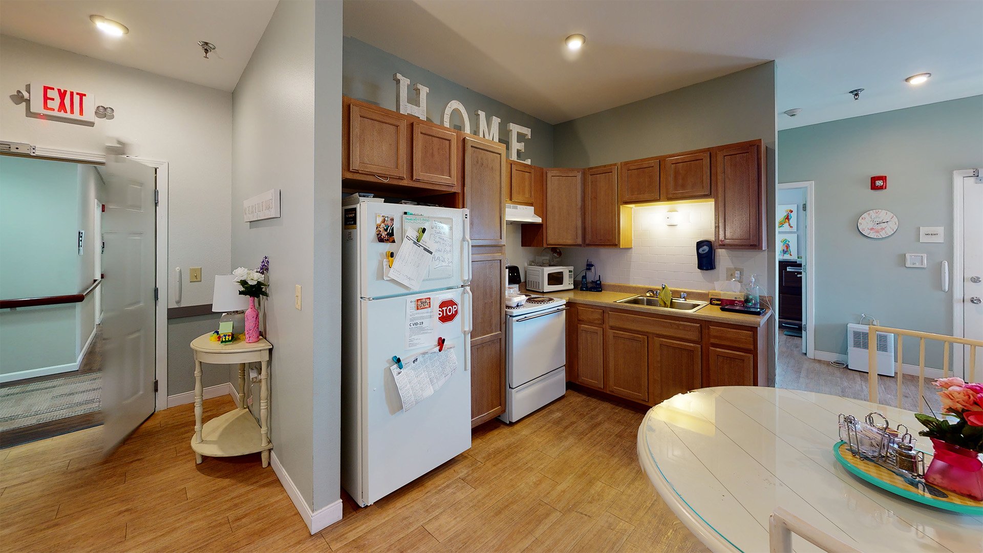 An accessible kitchenette in a senior apartment at Cedarhurst of Highland, designed for ease of use and independence