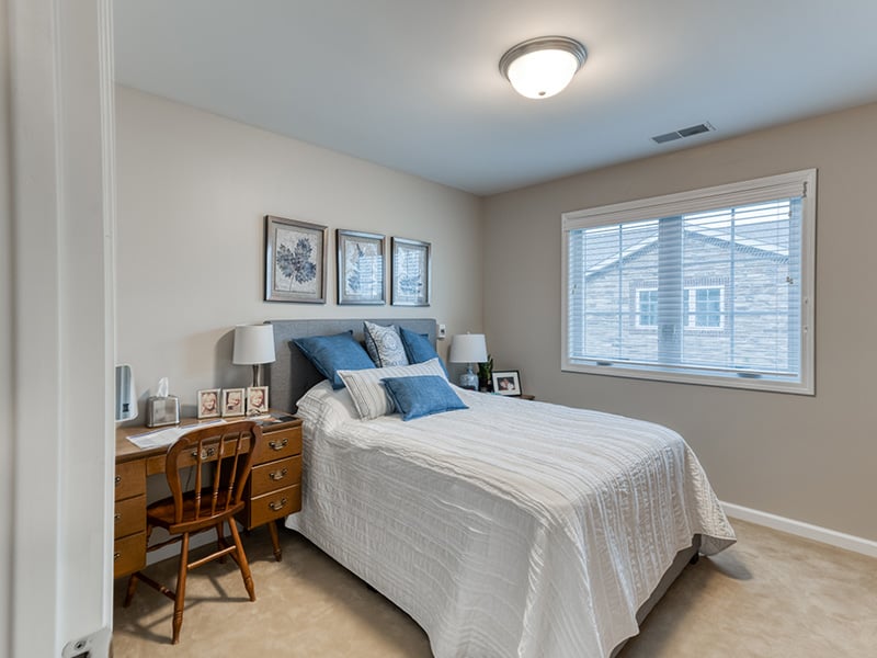 Bedroom of a senior apartment at Cedarhurst of Jacksonville, designed for resident comfort and personalization