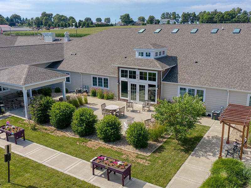 Shaded outdoor area at Cedarhurst of Jacksonville, complete with a beautiful pergola for comfort and relaxation