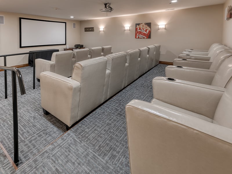 The comfortable and accessible movie theater at Cedarhurst of Jacksonville, providing easy-to-access entertainment for residents.