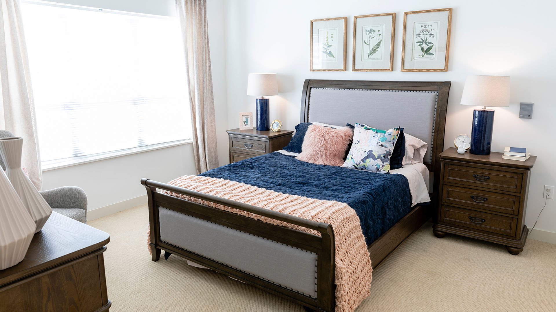Bedroom of a senior apartment at Cedarhurst of La Vista, designed for resident comfort and personalization