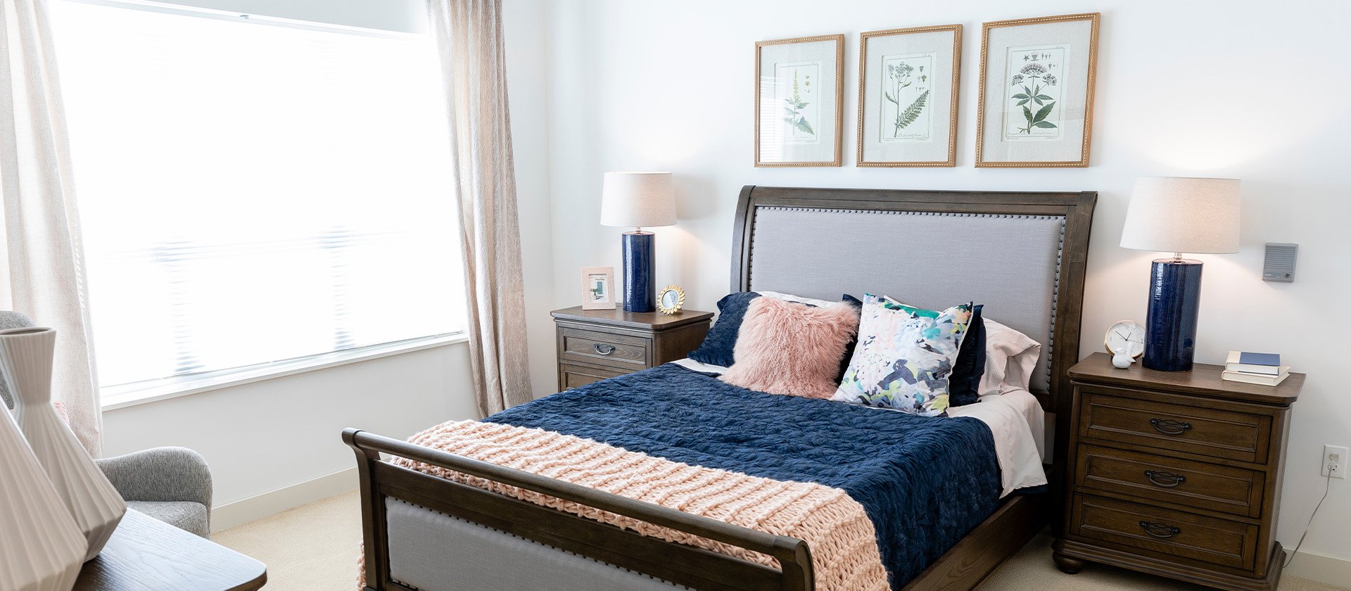 Bedroom of a senior apartment at Cedarhurst of La Vista, designed for resident comfort and personalization