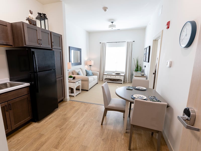 An accessible kitchenette in a senior apartment at Cedarhurst of La Vista, designed for ease of use and independence