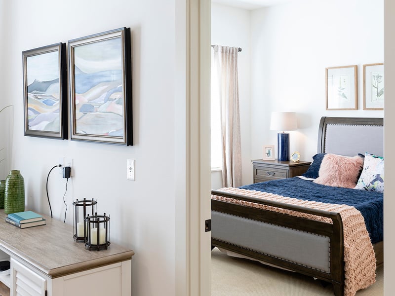 A spacious and bright living room inside a senior apartment at Cedarhurst of La Vista