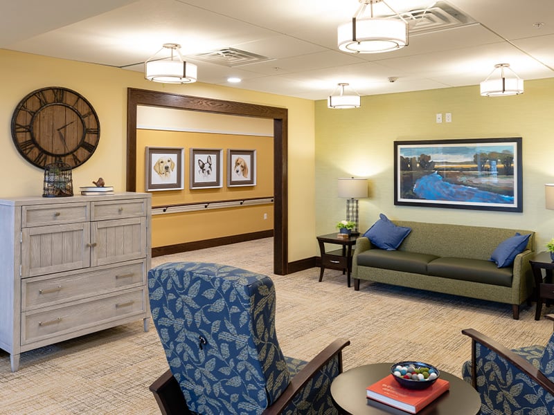 A spacious and inviting common area at Cedarhurst of La Vista, designed for connection with comfortable seating for residents across all living options