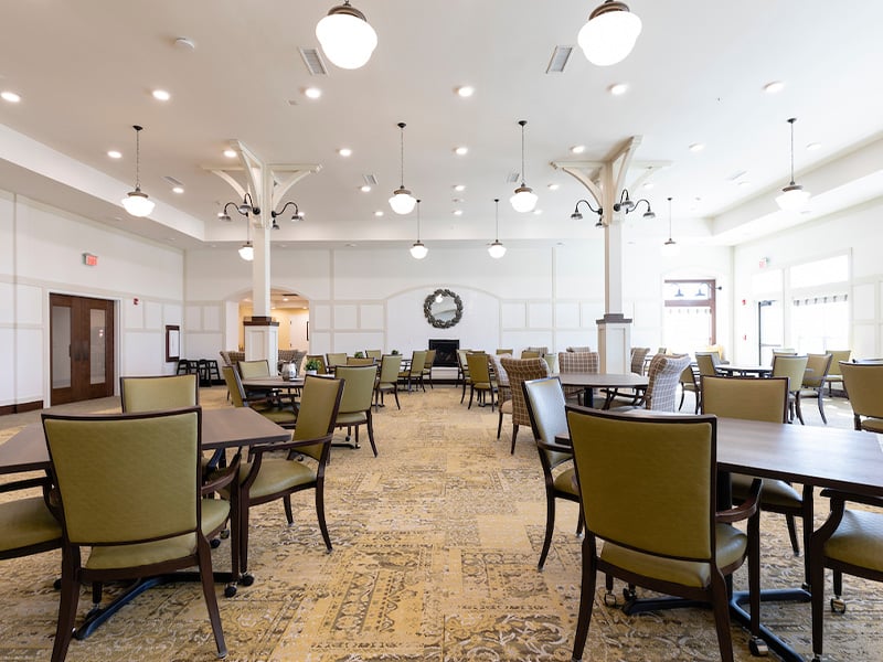 Another elegant dining space at Cedarhurst of La Vista, offering comfortable, accessible seating for resident meals.