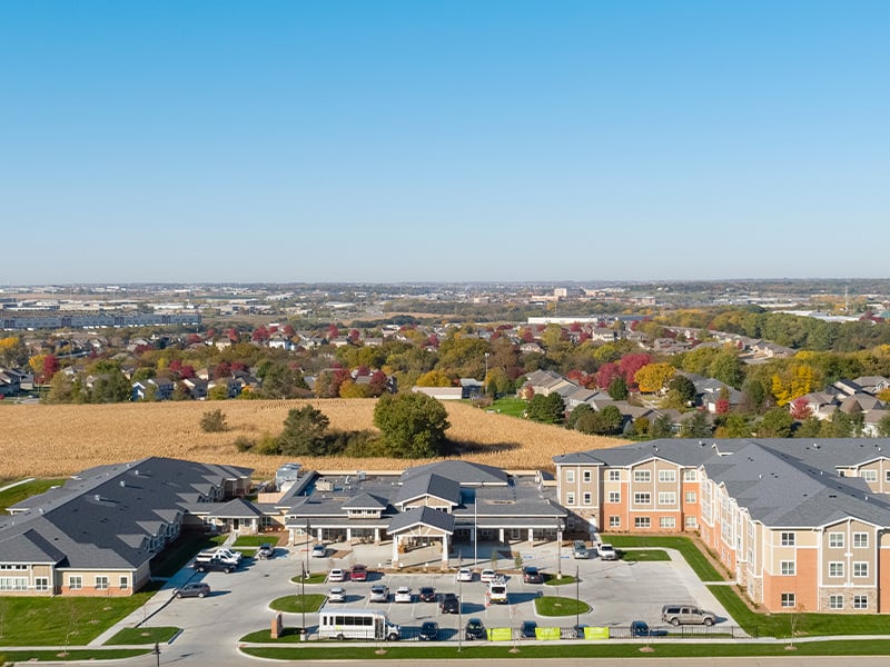 Aerial view of the entire Cedarhurst of La Vista senior living community building and grounds