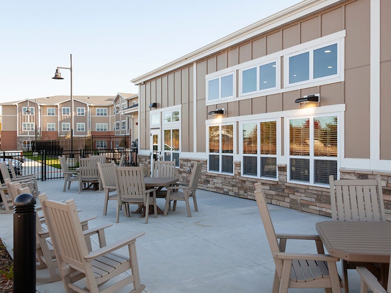 An inviting outdoor space at Cedarhurst of La Vista, providing areas for relaxation and enjoyment