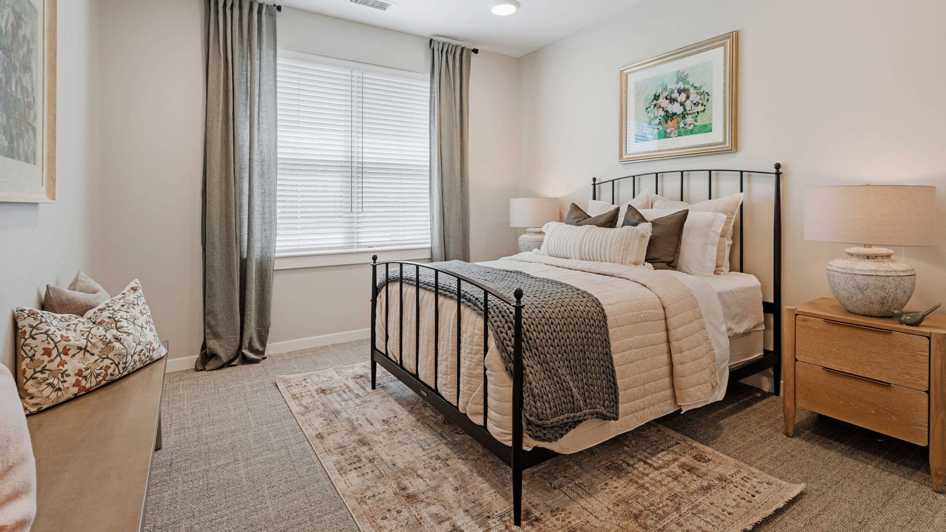 Bedroom of a senior apartment at Cedarhurst of Lawrence, designed for resident comfort and personalization.