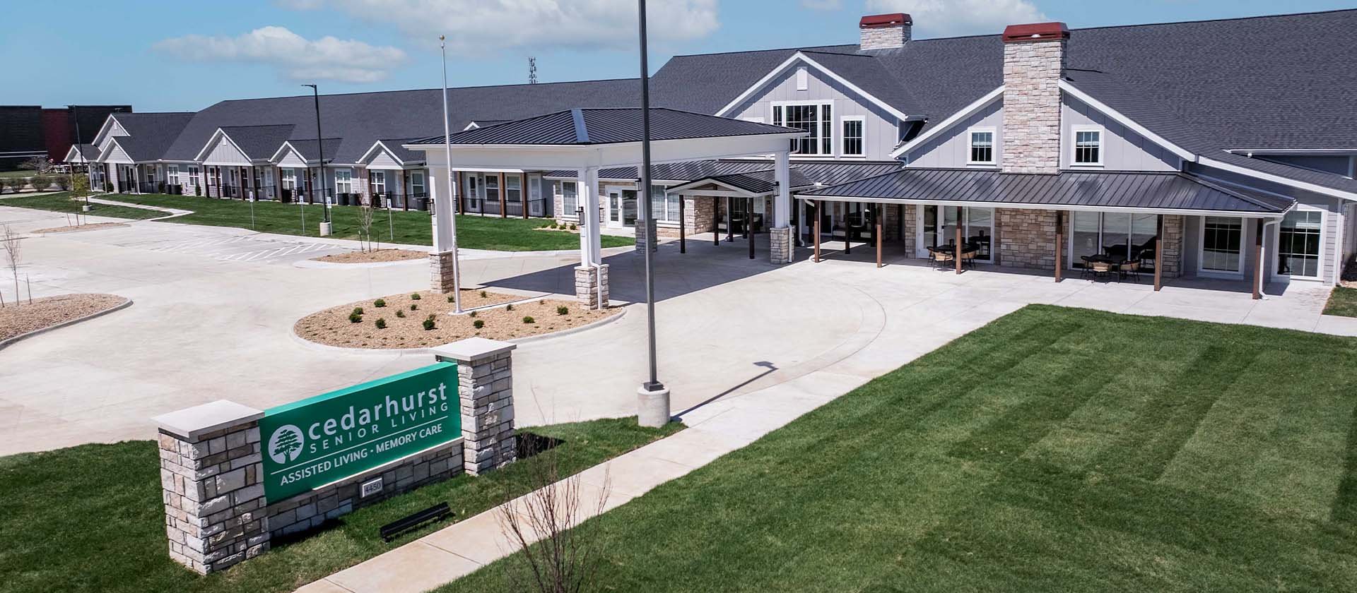 The welcoming front exterior of Cedarhurst of Lawrence senior living community