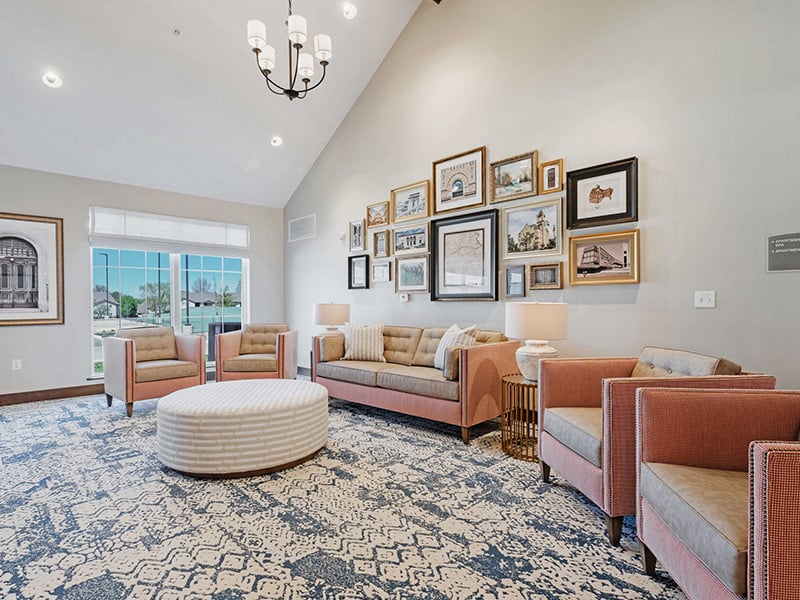 Cedarhurst of Lawrence's inviting common area, designed with senior-friendly seating and a warm fireplace for relaxation and warmth
