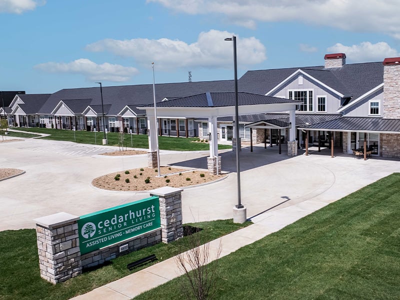 The welcoming front exterior of Cedarhurst of Lawrence senior living community