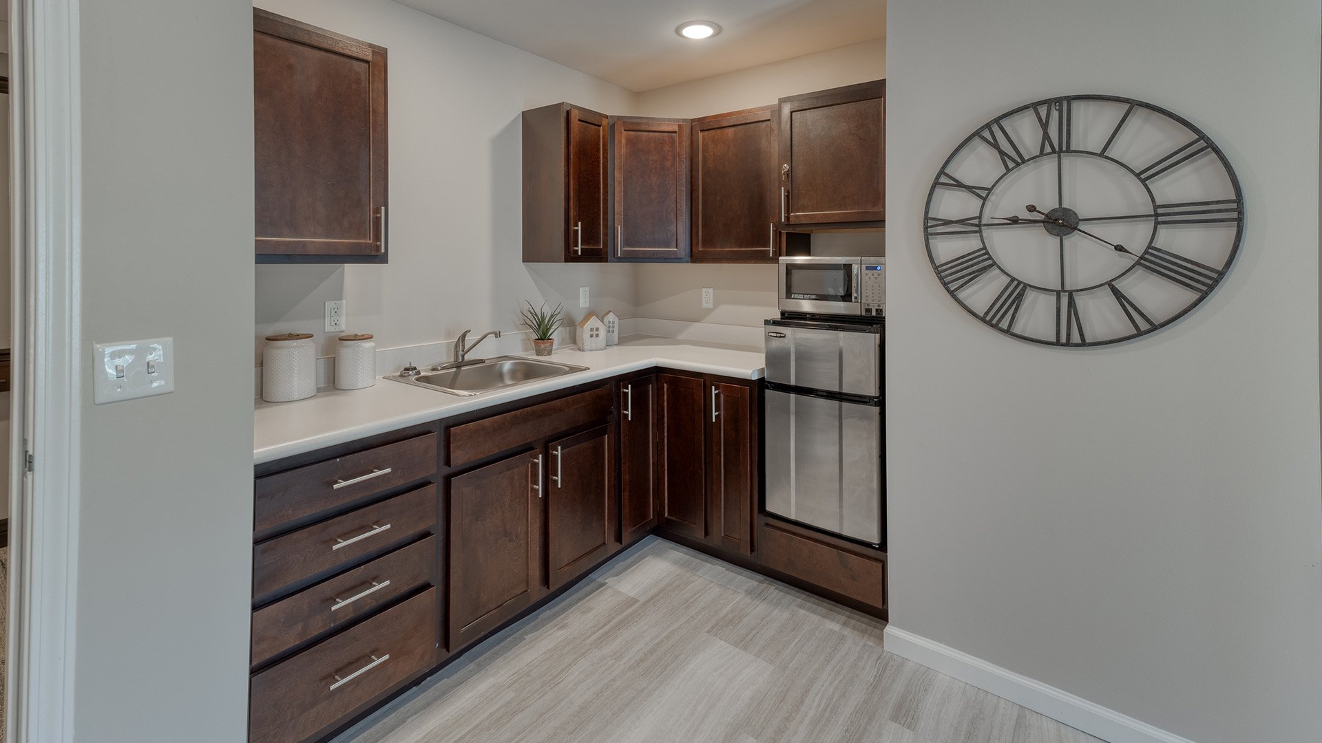 An accessible kitchenette in a senior apartment at Cedarhurst of Lebanon, designed for ease of use and independence.