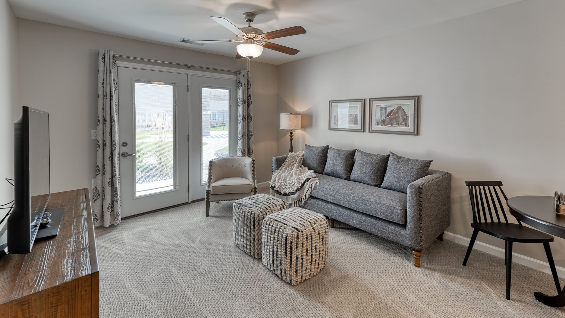 Senior-friendly apartment living room at Cedarhurst of Lebanon, offering comfortable and accessible design for residents.