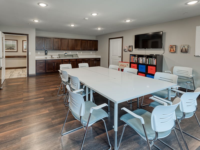 Residents at Cedarhurst of Lebanon enjoy a dedicated art and activity room, offering an accessible space for hobbies, crafts, and games.