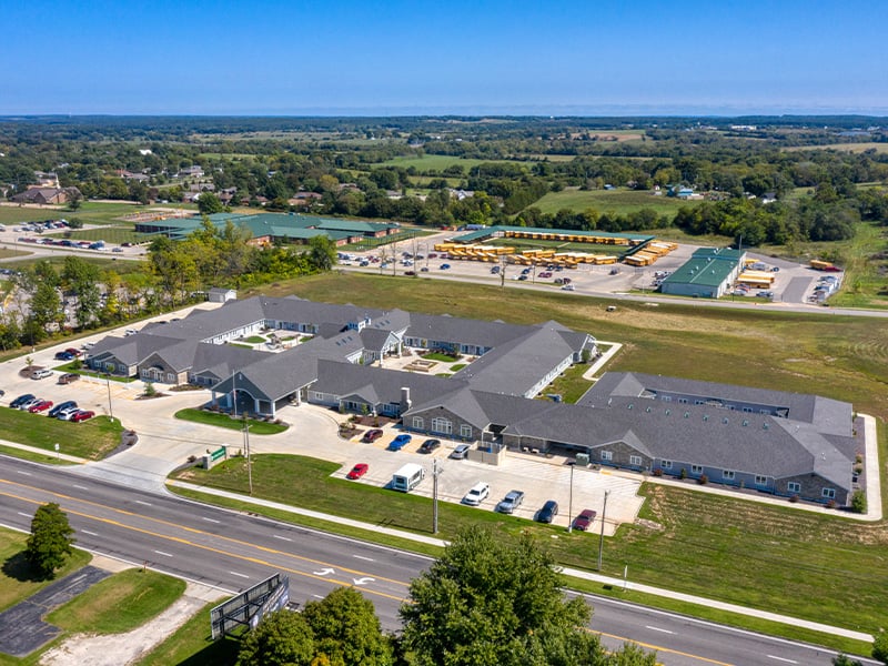 Aerial view of the entire Cedarhurst of Lebanon senior living community building and grounds.