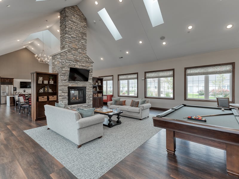 Residents can enjoy a friendly game of pool in the well-equipped game room at Cedarhurst of Lebanon.