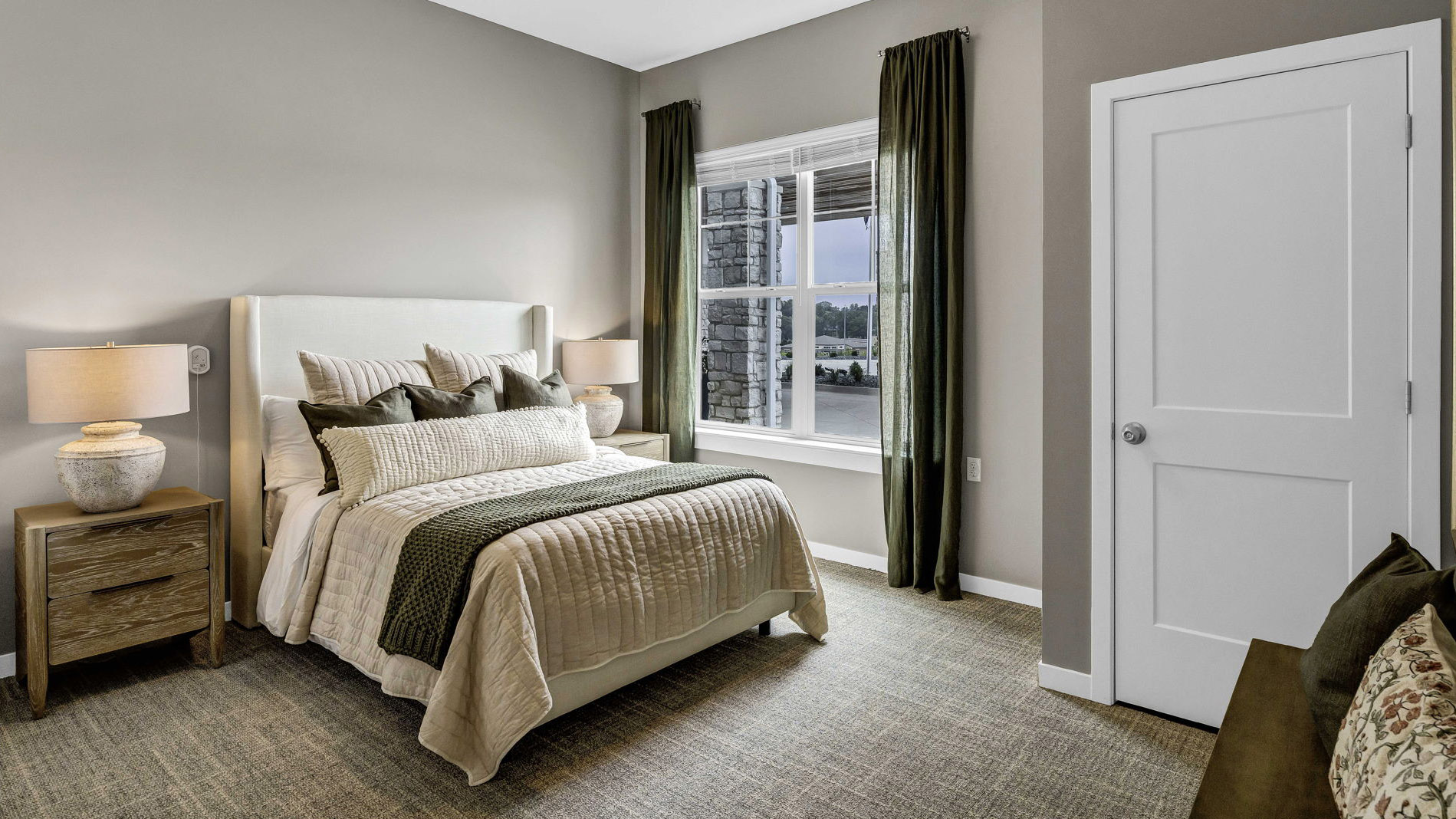 Bedroom of a senior apartment at Cedarhurst of Lincoln, designed for resident comfort and personalization