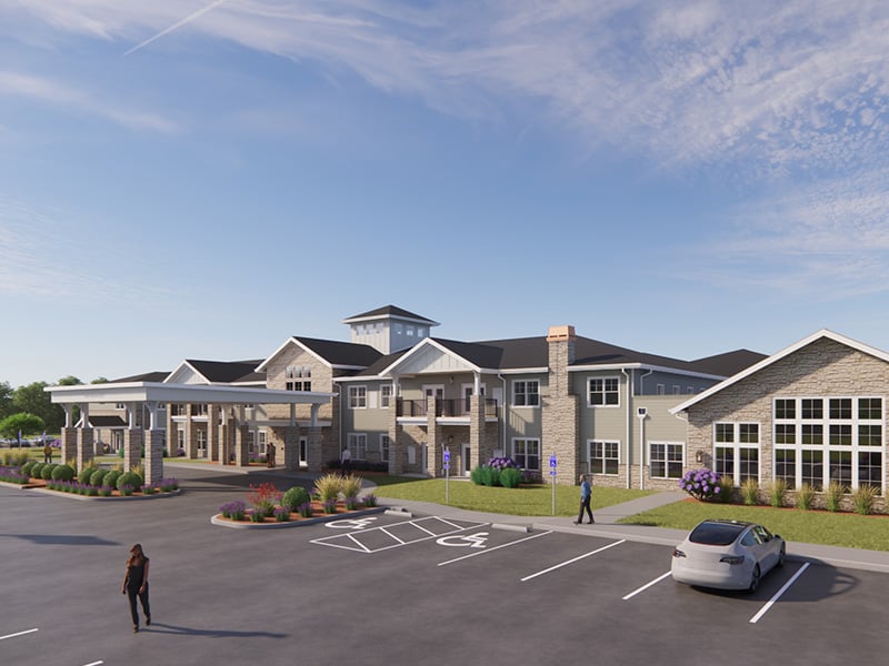 An inviting view of the Cedarhurst of Lincoln senior living community from the outside, complete with the main building and its distinctive sign
