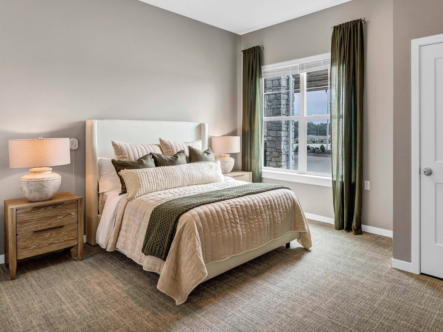 Bedroom of a senior apartment at Cedarhurst of Lincoln, designed for resident comfort and personalization