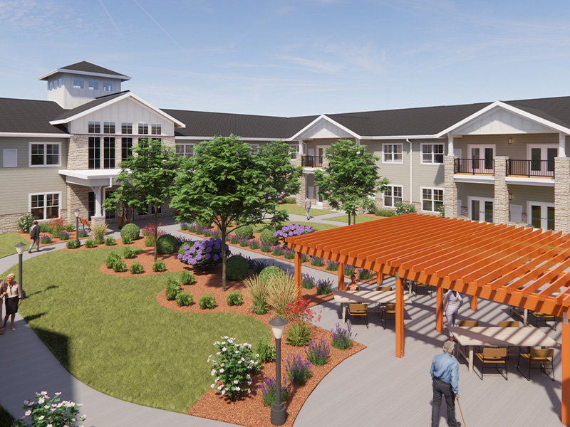 Outdoor green space at Cedarhurst of Lincoln with paved walking paths, a wooden pergola, and fireplace