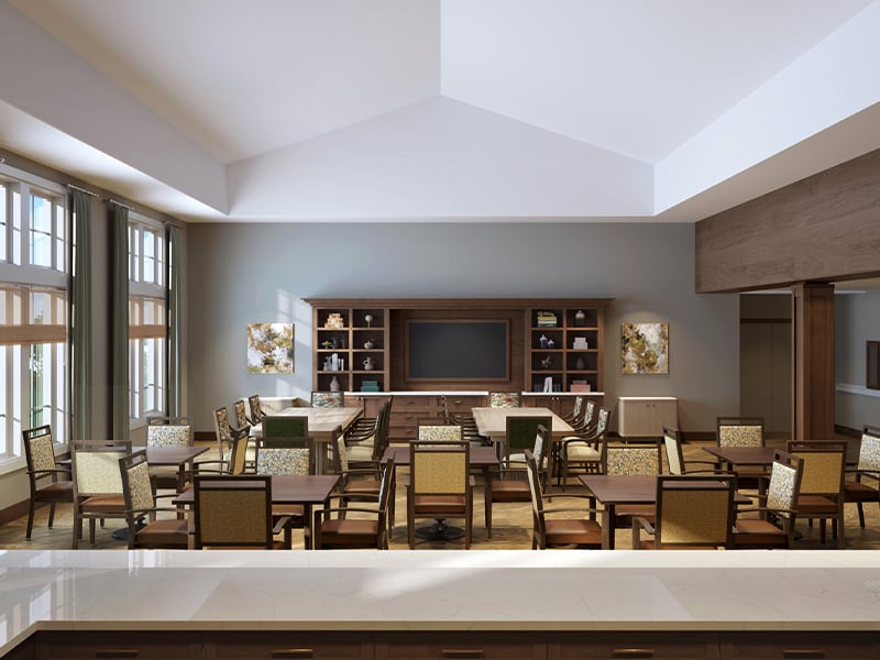 A bright and welcoming activity room at Cedarhurst of Manhattan, offering various opportunities for recreation
