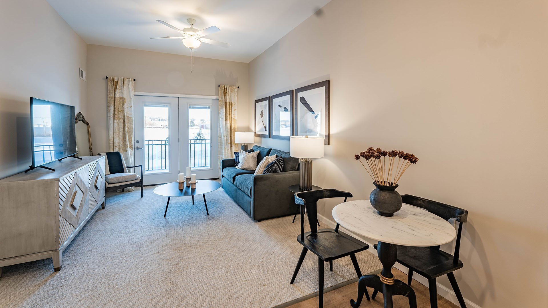 Senior-friendly apartment living room at Cedarhurst of McHenry, offering comfortable and accessible design for residents.