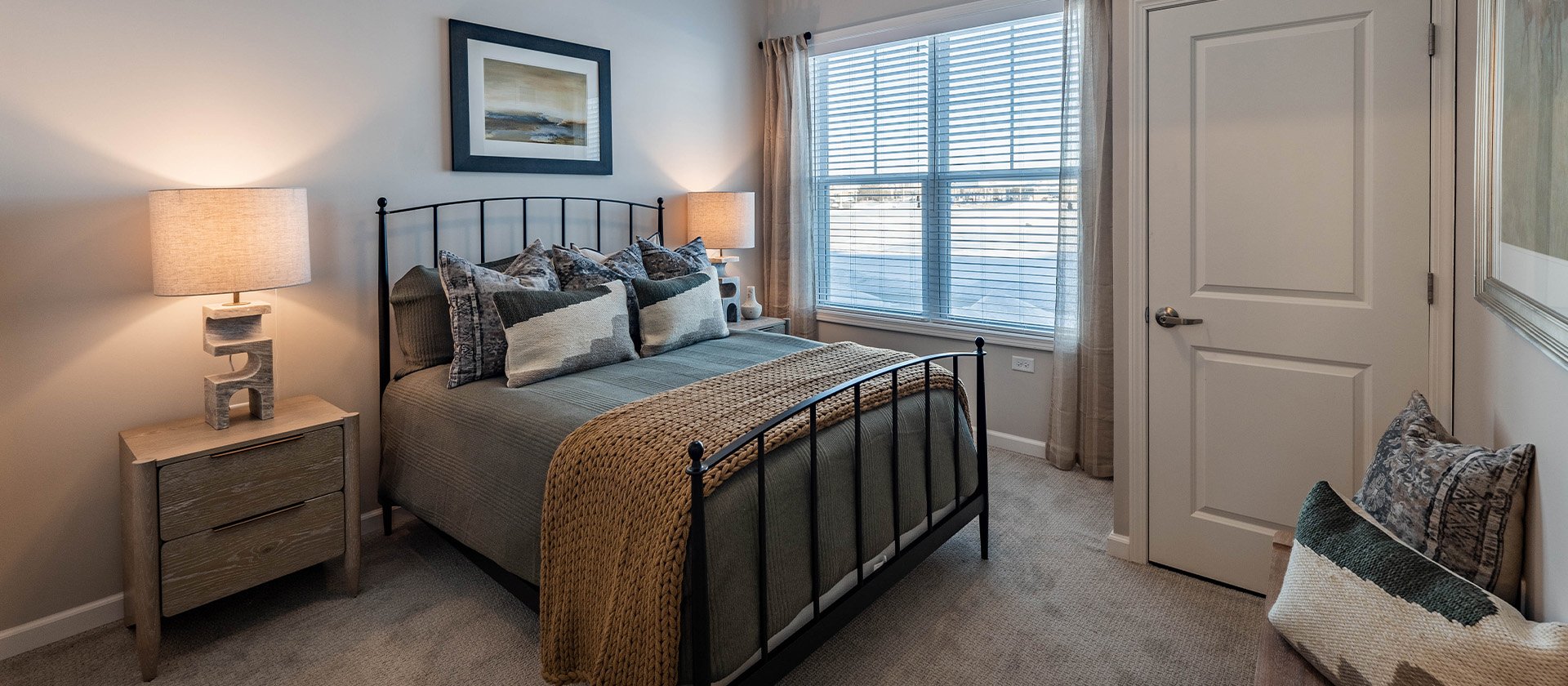 Bedroom of a senior apartment at Cedarhurst of McHenry, designed for resident comfort and personalization.