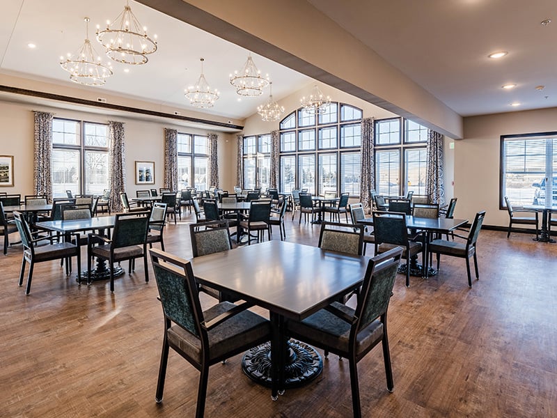 A community dining room at Cedarhurst of McHenry, providing convenient all-day dining for residents.