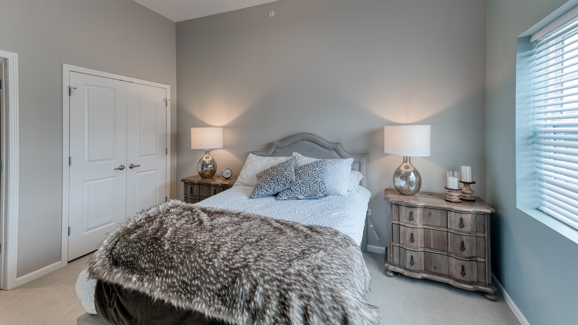 Bedroom of a senior apartment at Cedarhurst of Naperville, designed for resident comfort and personalization.