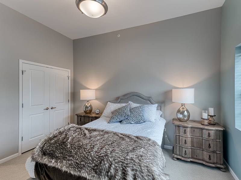 Bedroom of a senior apartment at Cedarhurst of Naperville, designed for resident comfort and personalization.