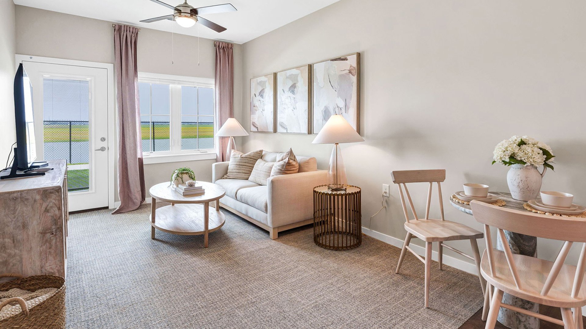 Senior-friendly apartment living room at Cedarhurst of Newburgh, offering comfortable and accessible design for residents.