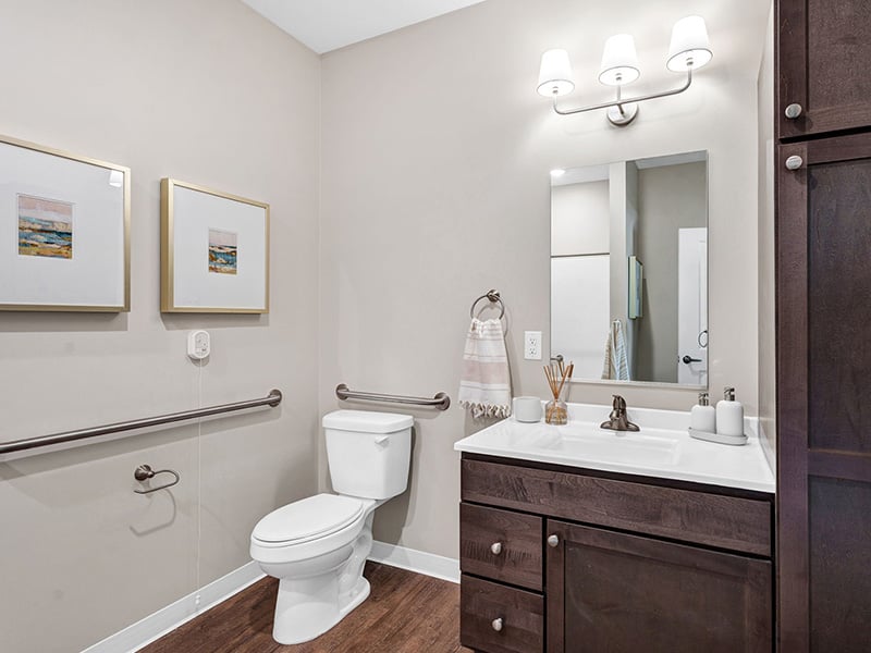 Bathroom of a senior apartment at Cedarhurst of Newburgh, built with accessibility features to support residents.