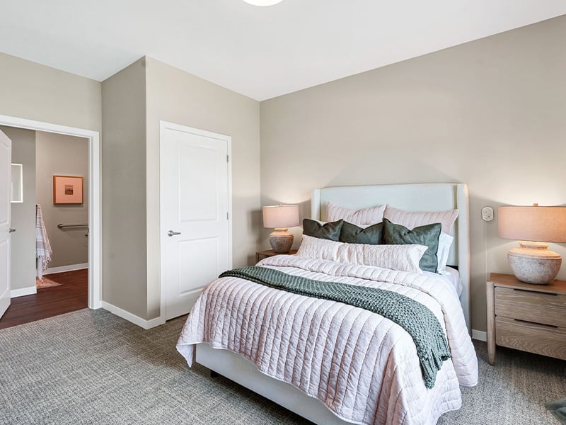 Cedarhurst of Newburgh: A cozy and well-appointed senior apartment bedroom for residents.