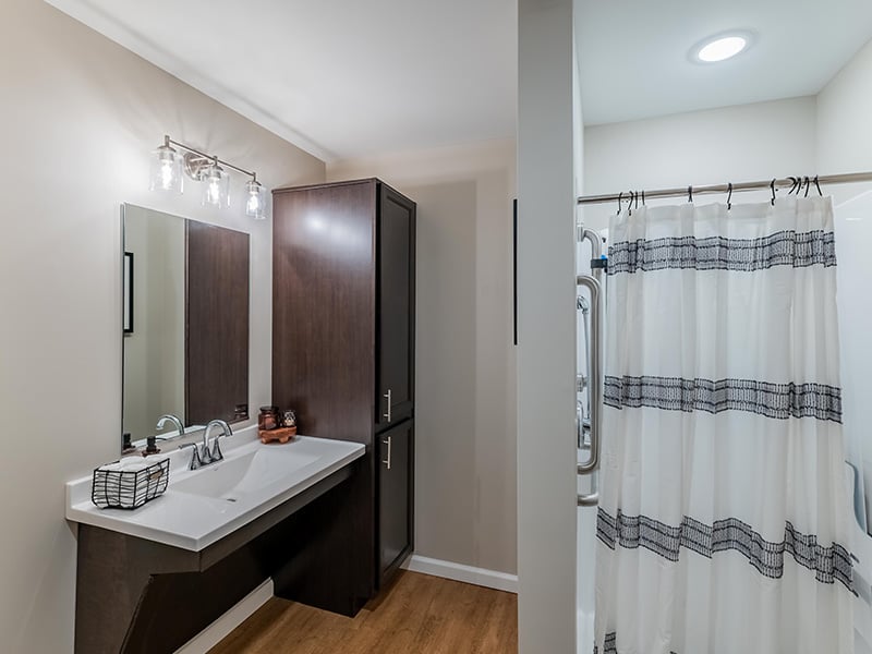Bathroom of a senior apartment at Cedarhurst of Nicholasville, built with accessibility features to support residents.