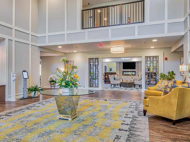 The bright and accessible main lobby at Cedarhurst of O'Fallon, offering a warm first impression to the senior living community
