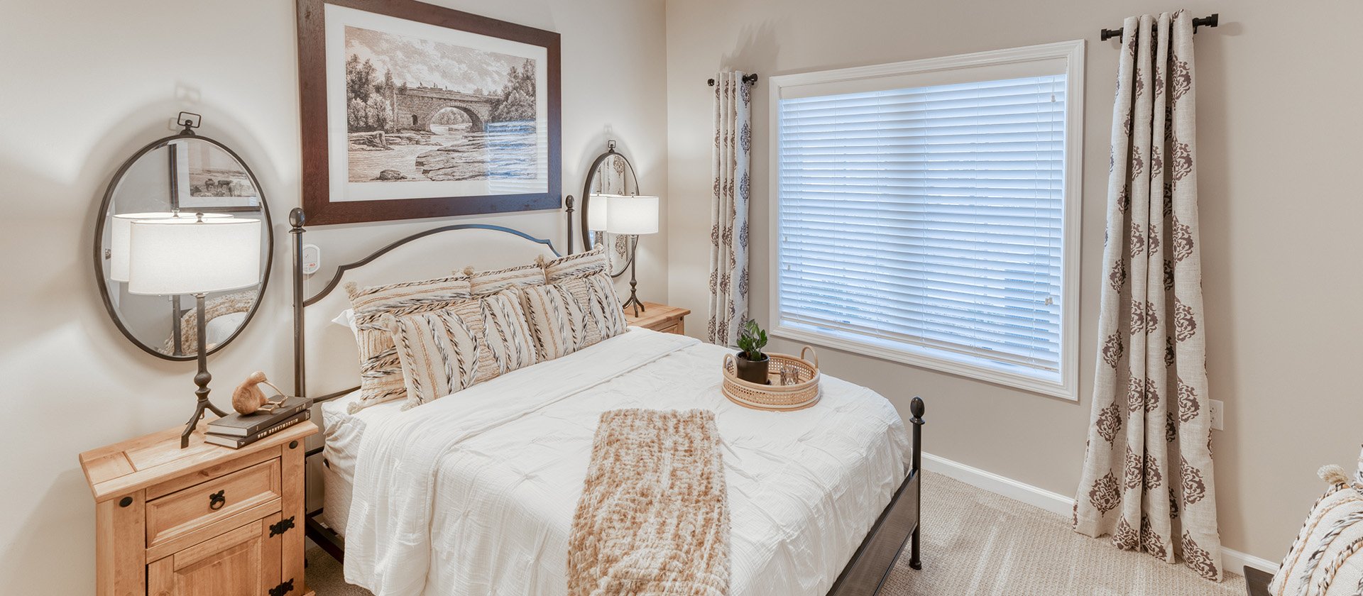 Bedroom of a senior apartment at Cedarhurst of Owensboro, designed for resident comfort and personalization.