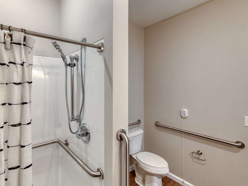 Bathroom of a senior apartment at Cedarhurst of Owensboro, built with accessibility features to support residents.
