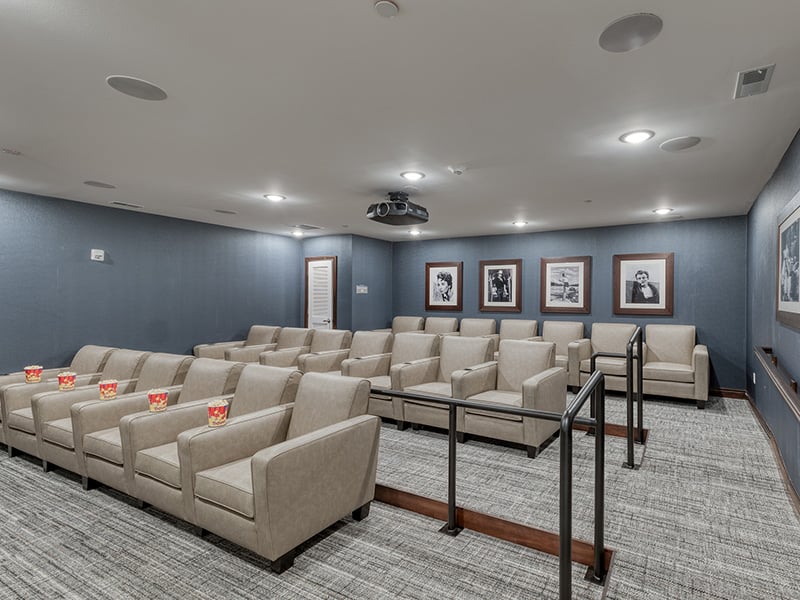 The comfortable and accessible movie theater at Cedarhurst of Owensboro, providing easy-to-access entertainment for residents.