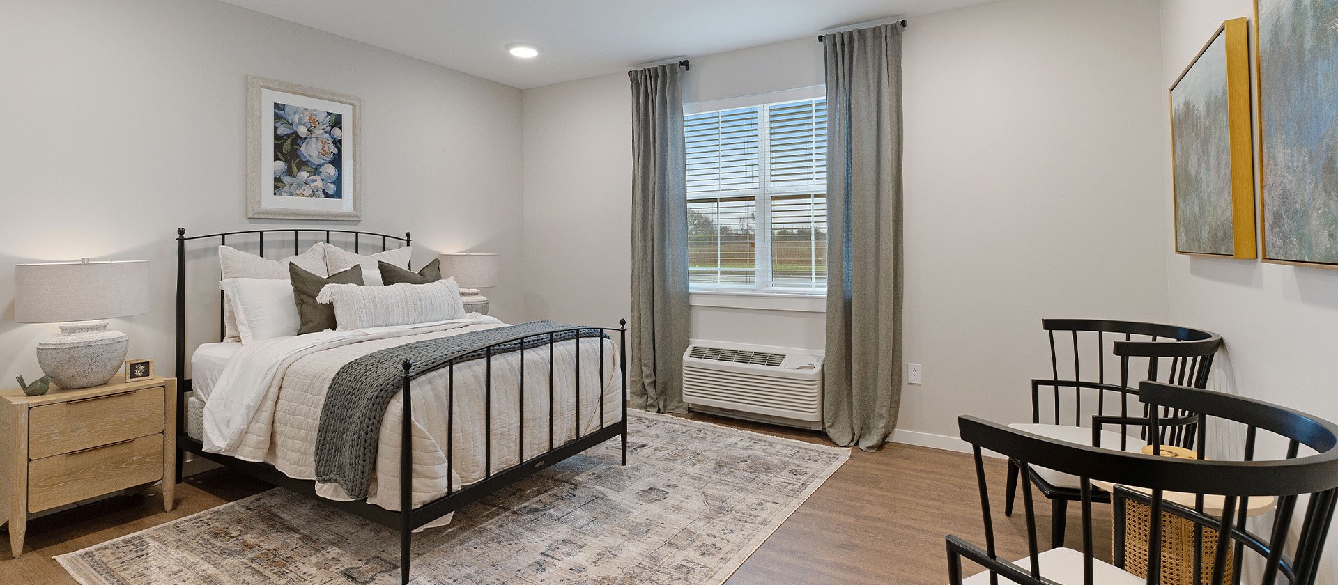 Bedroom of a senior apartment at Cedarhurst of Salina, designed for resident comfort and personalization