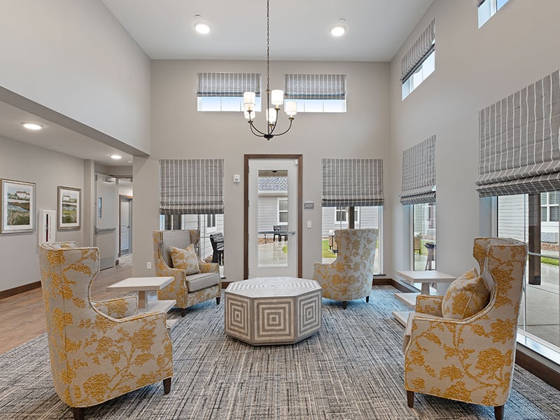 A welcoming common area at Cedarhurst of Salina, featuring ample seating