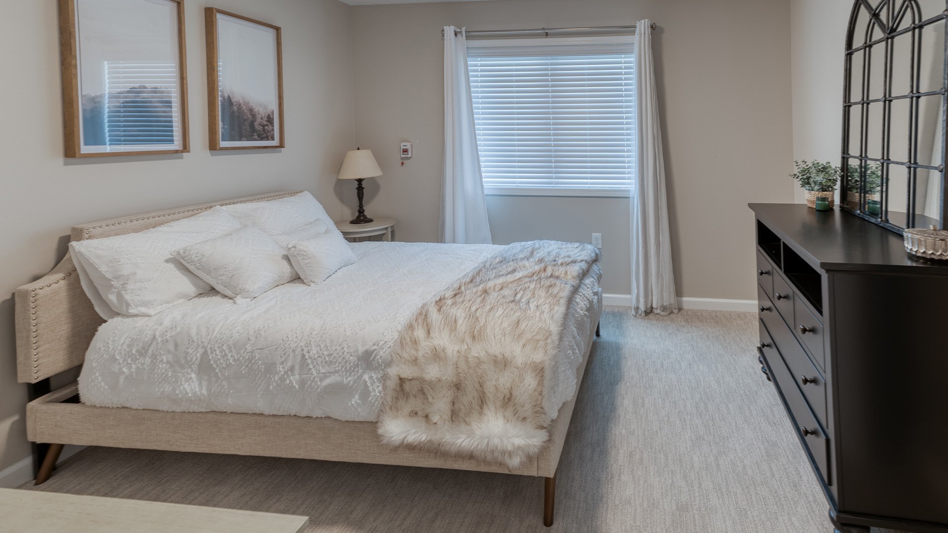 Bedroom of a senior apartment at Cedarhurst of Springfield, IL, designed for resident comfort and personalization
