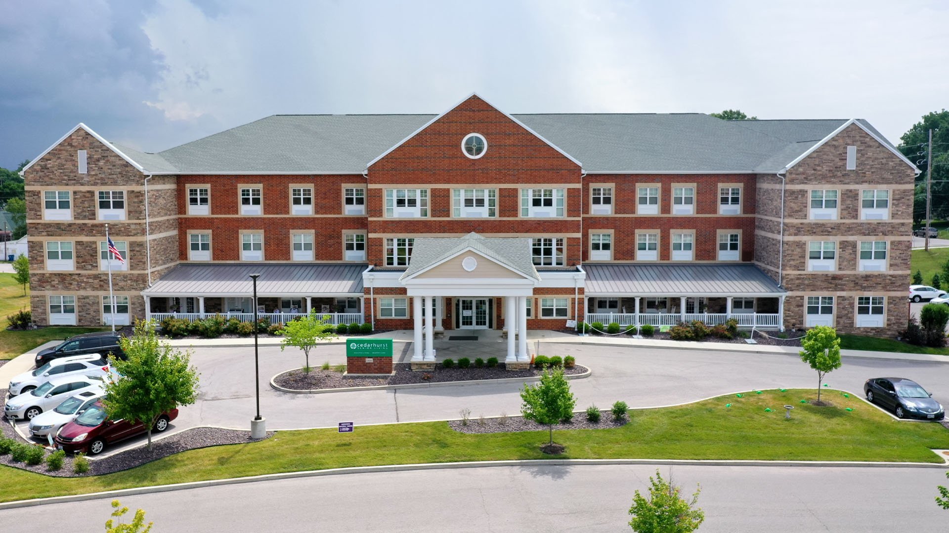 The welcoming front exterior of Cedarhurst of St. Charles senior living community