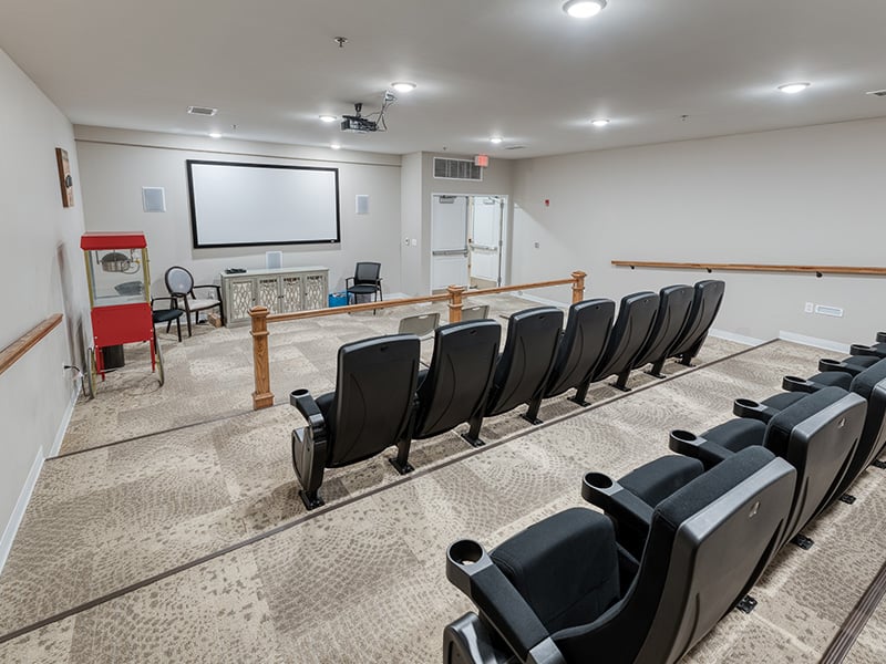 The comfortable and accessible movie theater at Cedarhurst of St. Charles, providing easy-to-access entertainment for residents