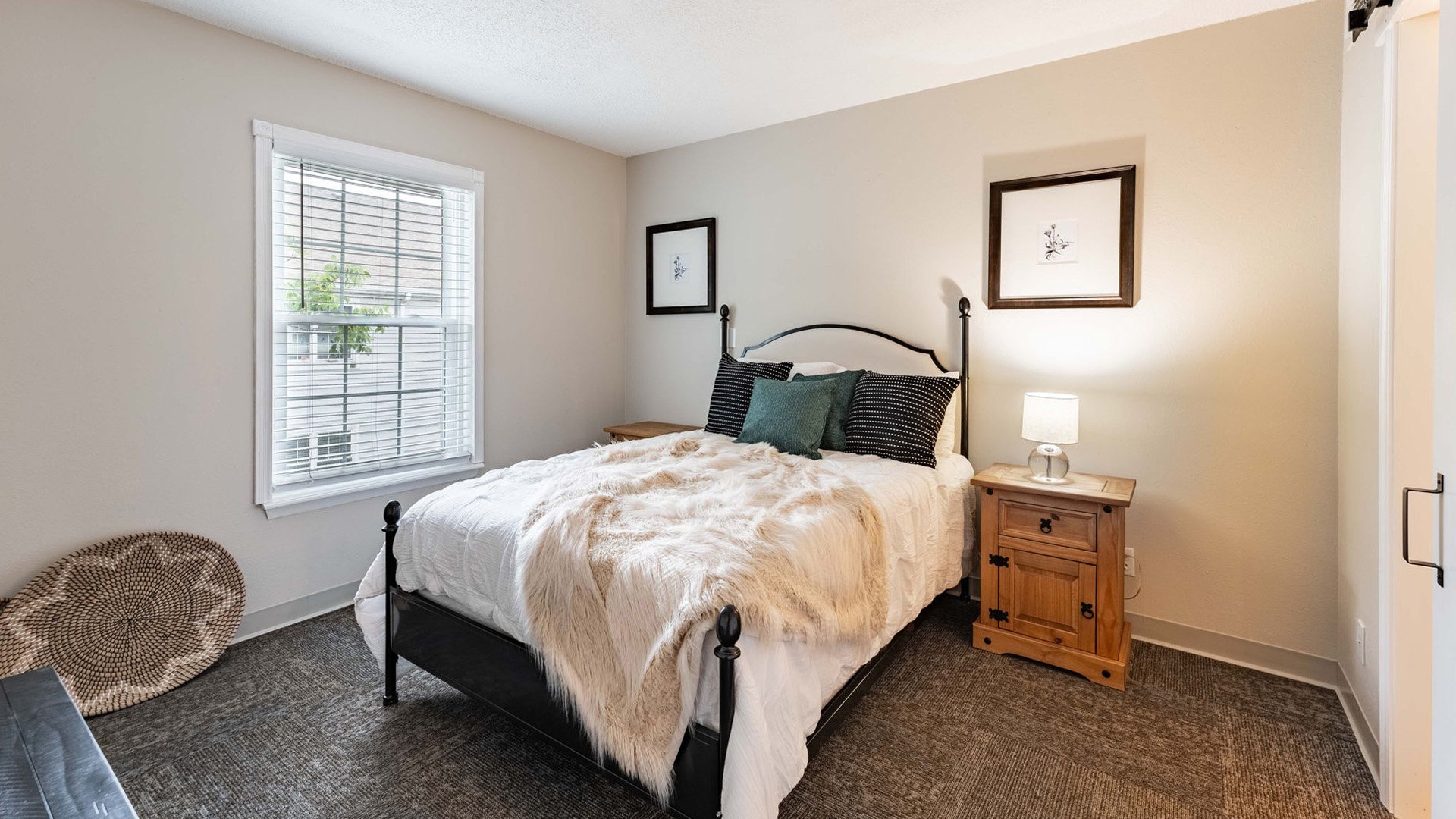 Bedroom of a senior apartment at Cedarhurst of Tesson Heights, designed for resident comfort and personalization