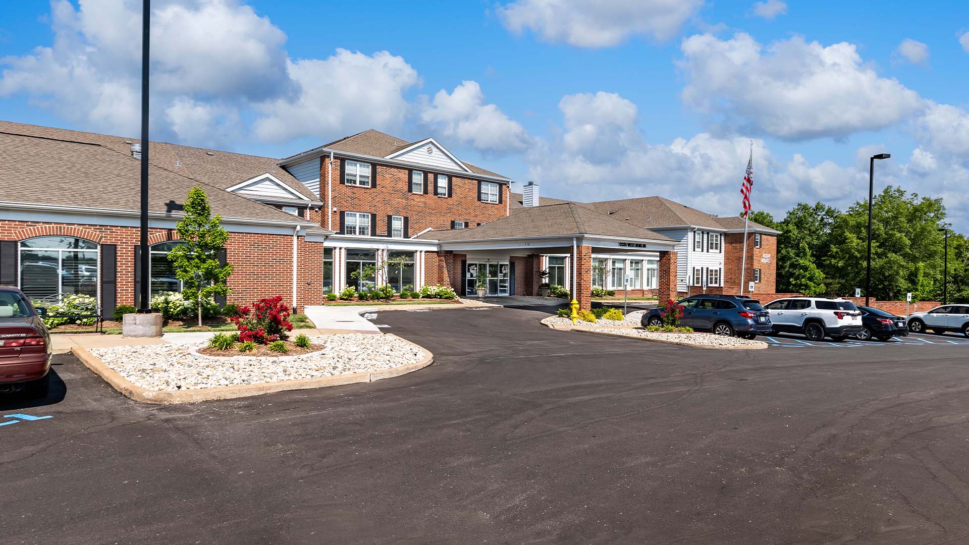 The welcoming front exterior of Cedarhurst of Tesson Heights senior living community